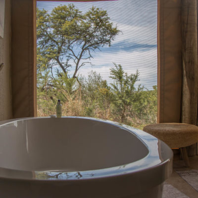 Ndaka safari lodge luxury tent bathroom